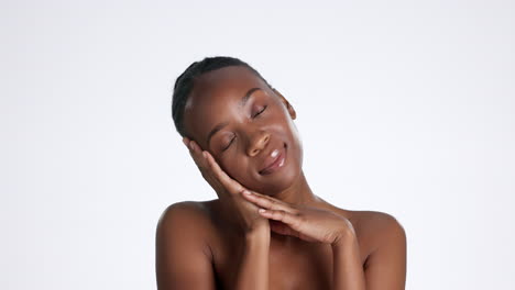 Black-woman,-face-and-content-with-skincare