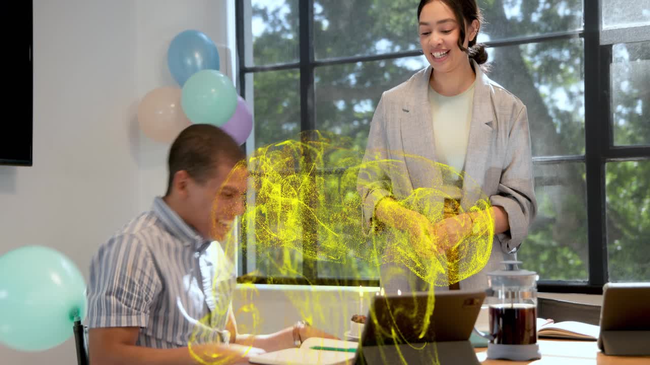 Office worker writing on tablet, woman bringing cake, yellow swirl over table, celebrating birthday