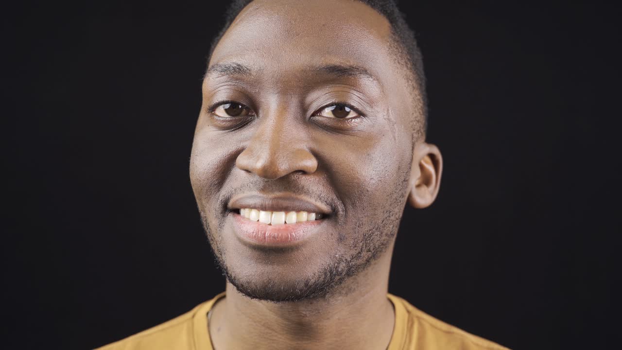 Close-up portrait of handsome African young man.