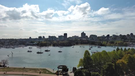 Drone-shot-of-False-creek-in-downtown-Vancouver-with-David-Lam-park-and-view-of-East-Vancouver