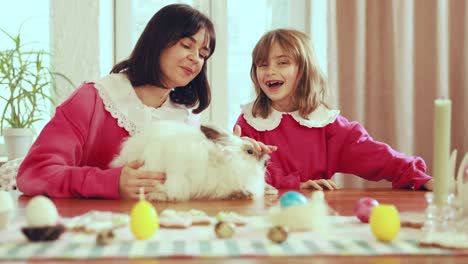 mother and daughter with easter bunny