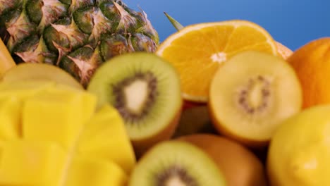 a detailed view of sliced kiwi and mango pieces, showcasing their vibrant colors and textures.