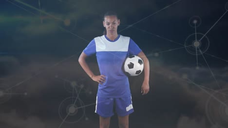 Animation-of-network-of-connections-over-african-american-soccer-player