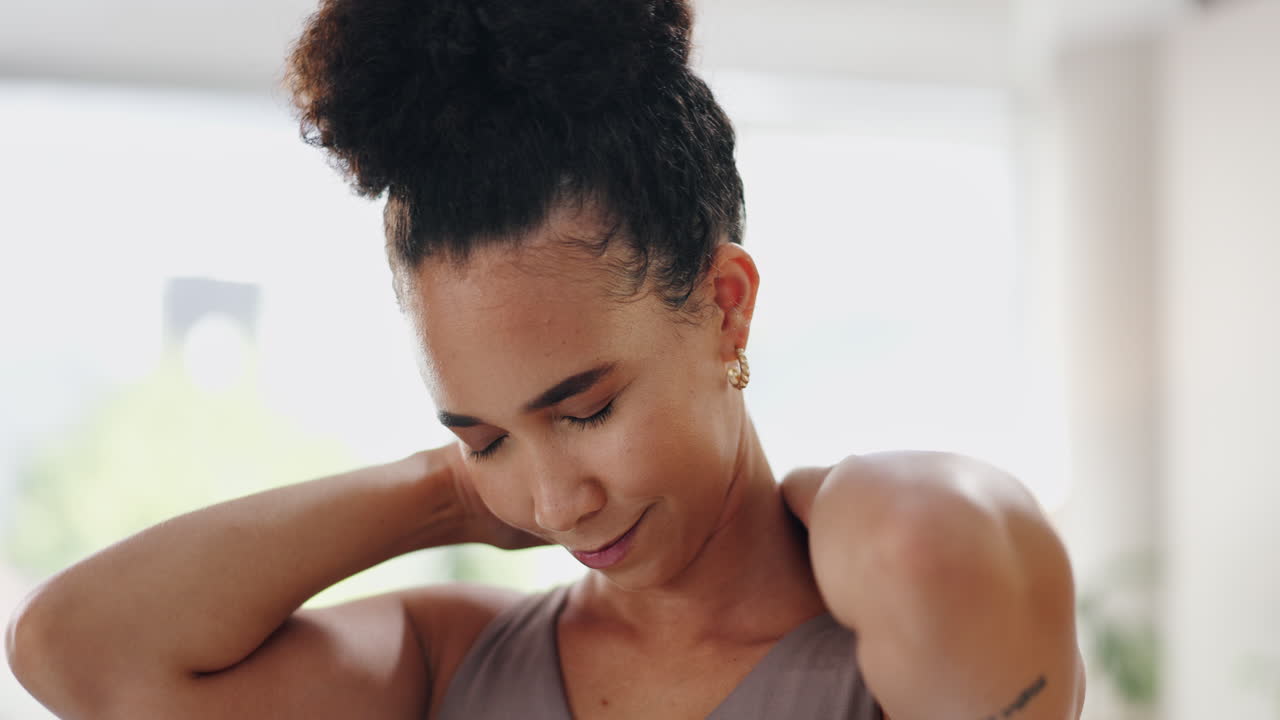Woman experiencing neck pain