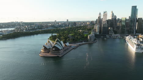 sydney opera house and cruise docked in the terminal in circular quay, sydney, australia