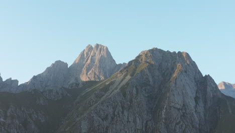 4k uhd drone mountain peaks at late sunset in northern italy