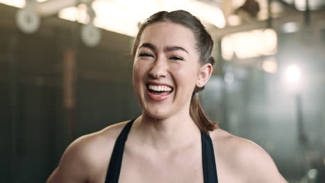 Laughing,-fitness-and-face-of-happy-woman-at-a-gym