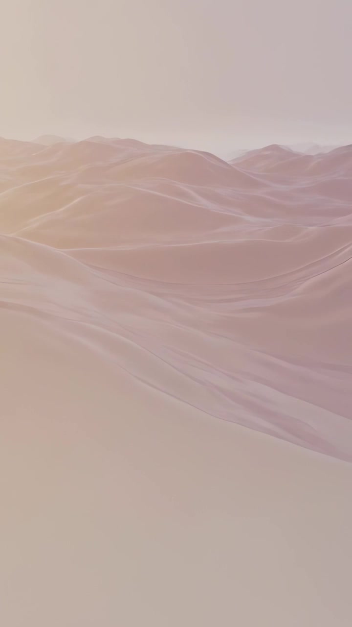 Vertical video: Shifting viewpoint revealing dunes for horizon reveal at sunrise on stylized set