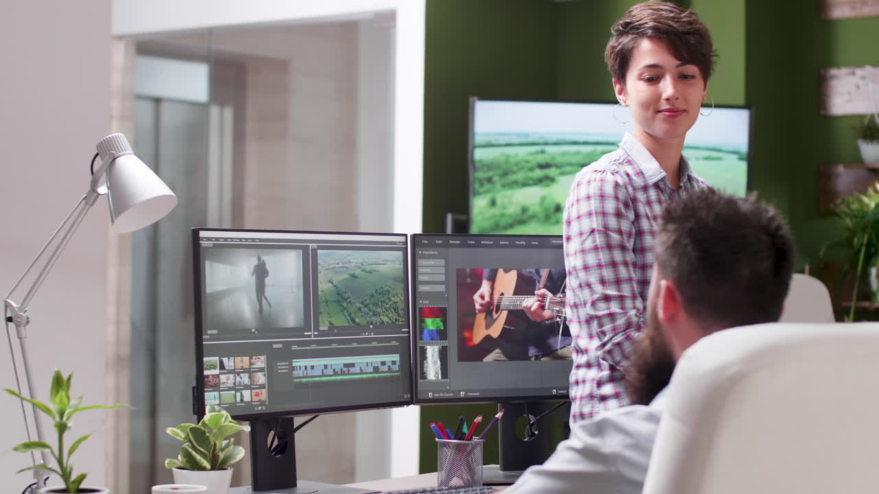 Video editing and color grading in a creative office