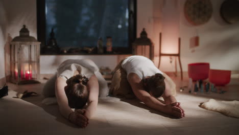 women in meditation and yoga pose