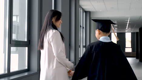 Mom-Hugging-And-Walking-With-Her-Son-1