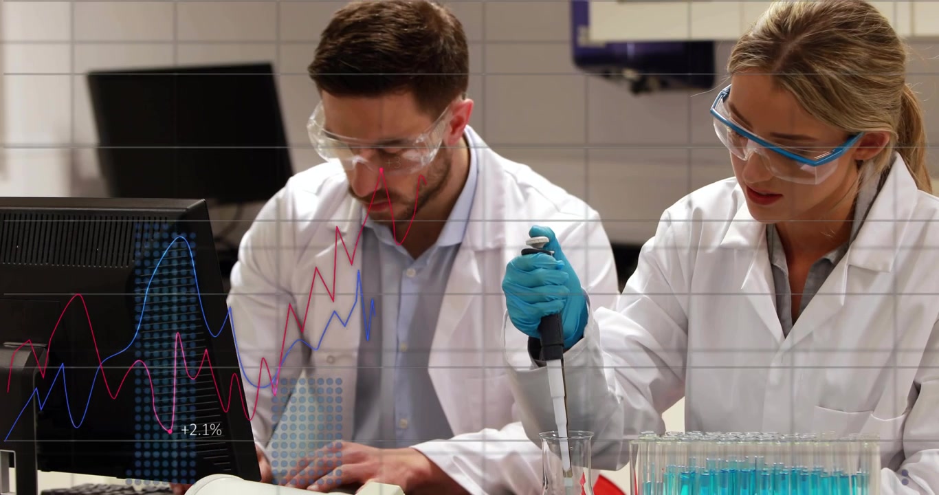 Pipetting lab-coated gloved tech adding blue liquid into tube rack at lab bench, male noting data
