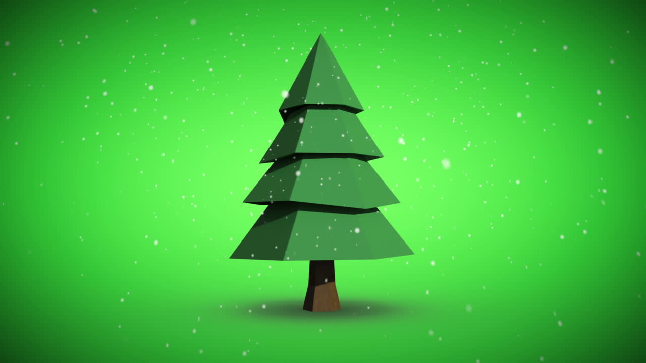 Snow falling on revolving fir tree