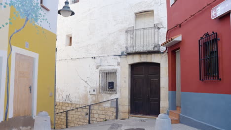 colorful narrow alleyway in a spanish town