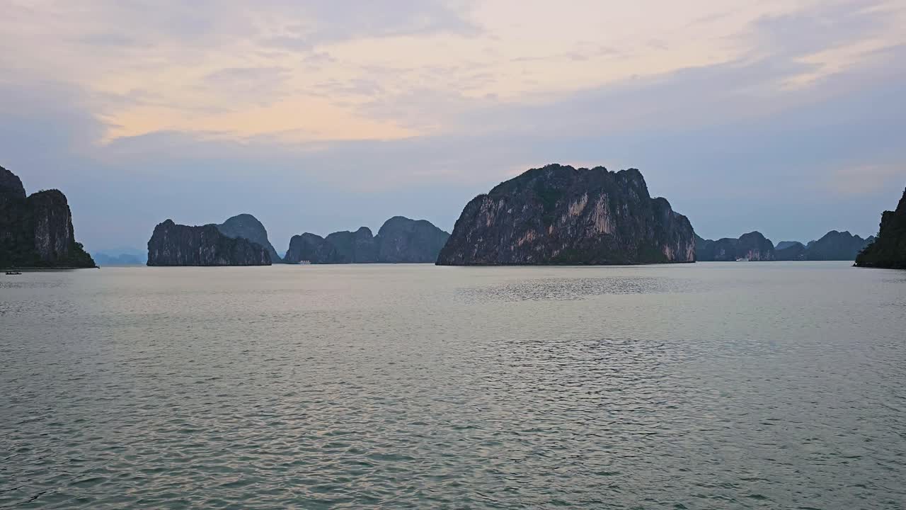 Limestone Islets At Ha Long Bay, UNESCO World Heritage Site In Vietnam at Sunset. - wide