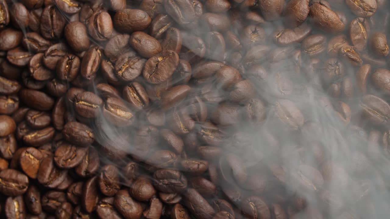 Coffee Beans Rotating With Smoke, Video In 4K, 50Fps