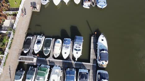 river thames at bourne end , buckinghamshire overhead of boat moored drone footage