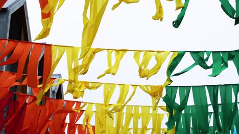 vibrant flags fluttering above a bustling street