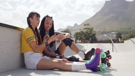 interracial skater couple taking a break