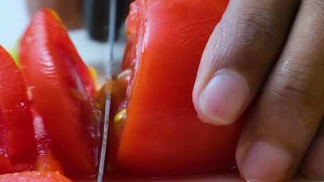 Close-Up-of-Cutting-Juicy-Cherry-Tomato