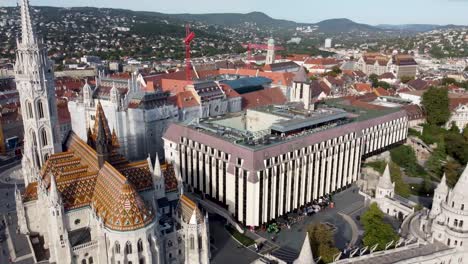 aerial pan reveals matthias church and danube river, budapest, hungary