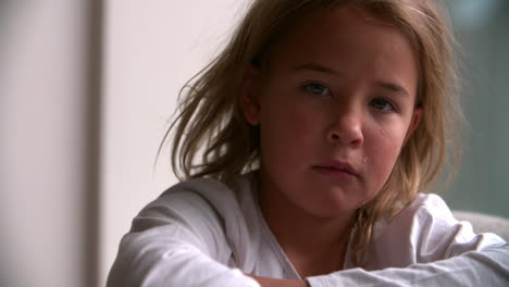 close up portrait of crying child looking at camera