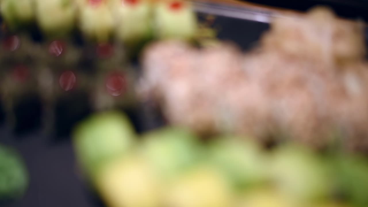 Close up of a sushi platter on a tabe at a restaurant