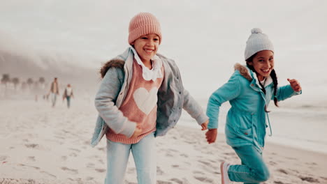 family, sister and kids running on the beach