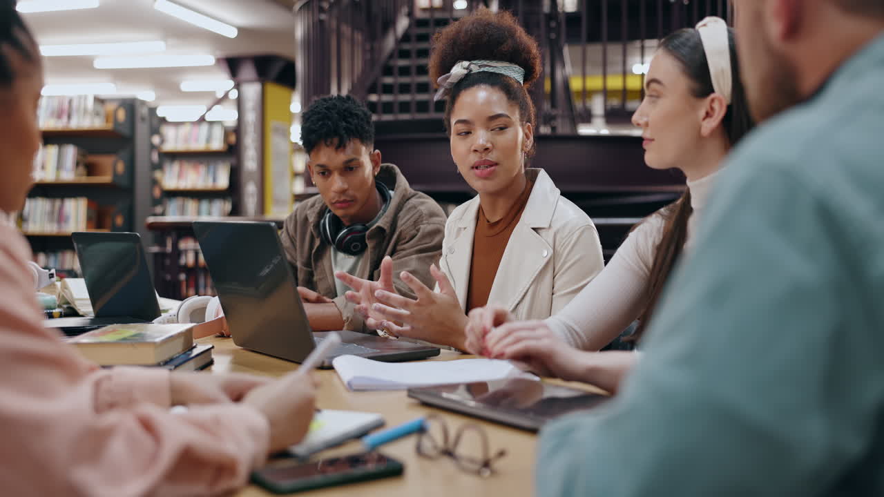 Students collaborating in the library