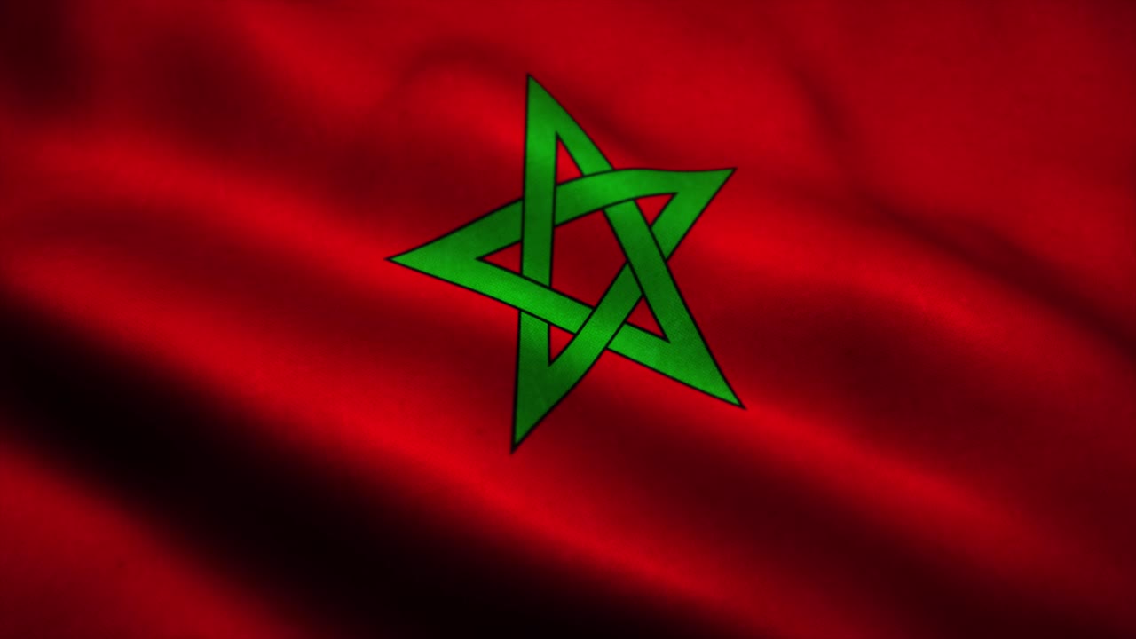 Bandiera del Marocco che sventola al vento. Bandiera nazionale del Marocco. Animazione in loop continuo del simbolo del Marocco. 4K.