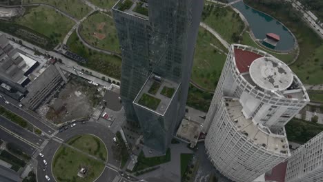 Santa-Fe-business-district-buildings-with-Helipad-in-Mexico-City,-aerial