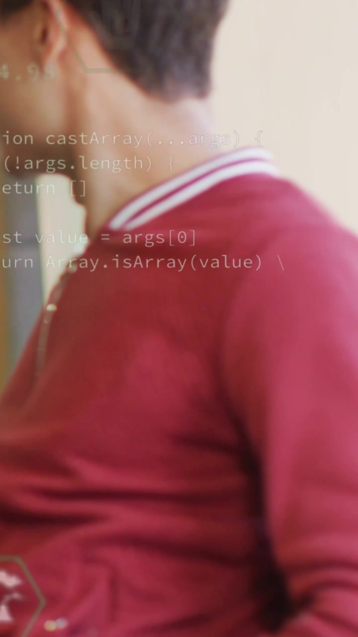 Vertical video: Man turning left causing hex icons, code overlaying torso, fading for tech demo