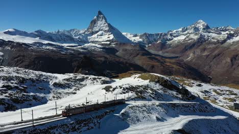 matterhorn gornergrat train on way to peak of tall mountain - gornergrat, switzerland