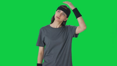 indian girl doing neck stretching green screen