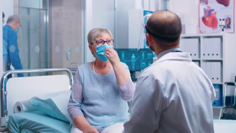 Old-retired-woman-at-doctor-consultation