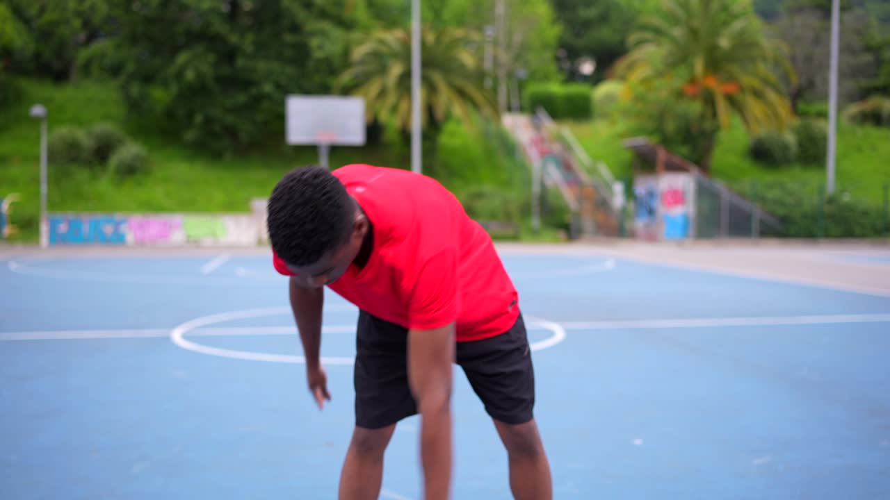 A Young Man Playing Basketball