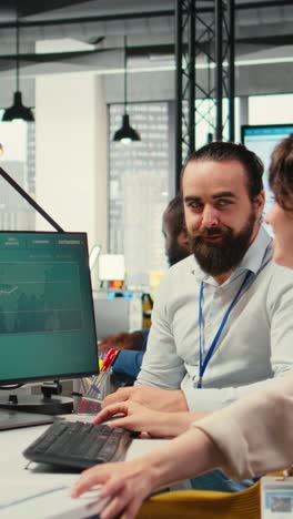 vertical video corporate manager and assistant collaborating on a new expansion vision