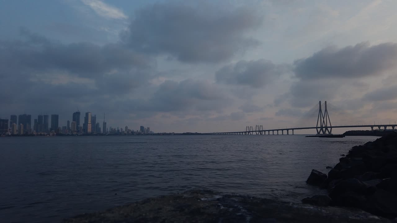 The sun sets over the Mumbai Sealink and Mahim Bay