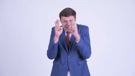 joven y guapo hombre de negocios en traje