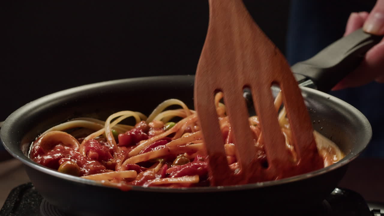 Cooking Pasta with Tomato Sauce