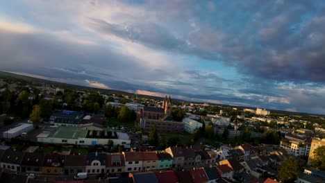 City-Svitavy-in-the-Czech-Republic-with-family-houses-and-real-estate-in-an-urban-location-with-a-red-church-in-sunny-autumn