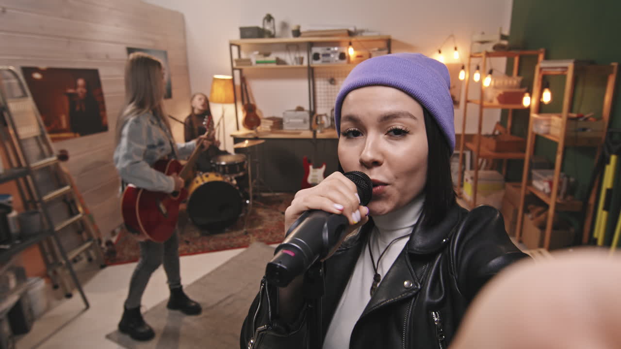 POV Of Girl Band Performing Rock Music