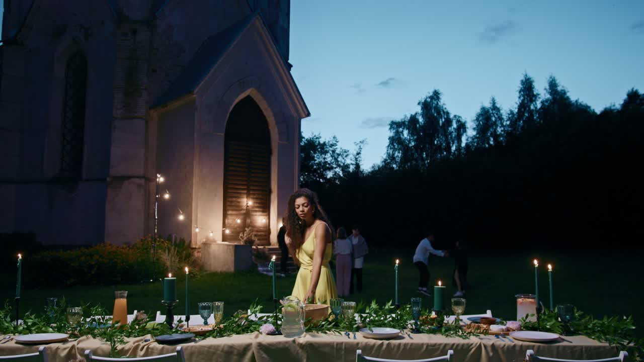 Outdoor Party by a Church at Night