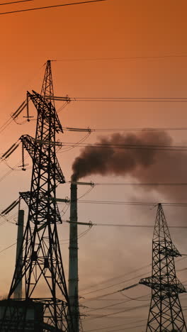 high voltage power station. high voltage electric line during sunset
