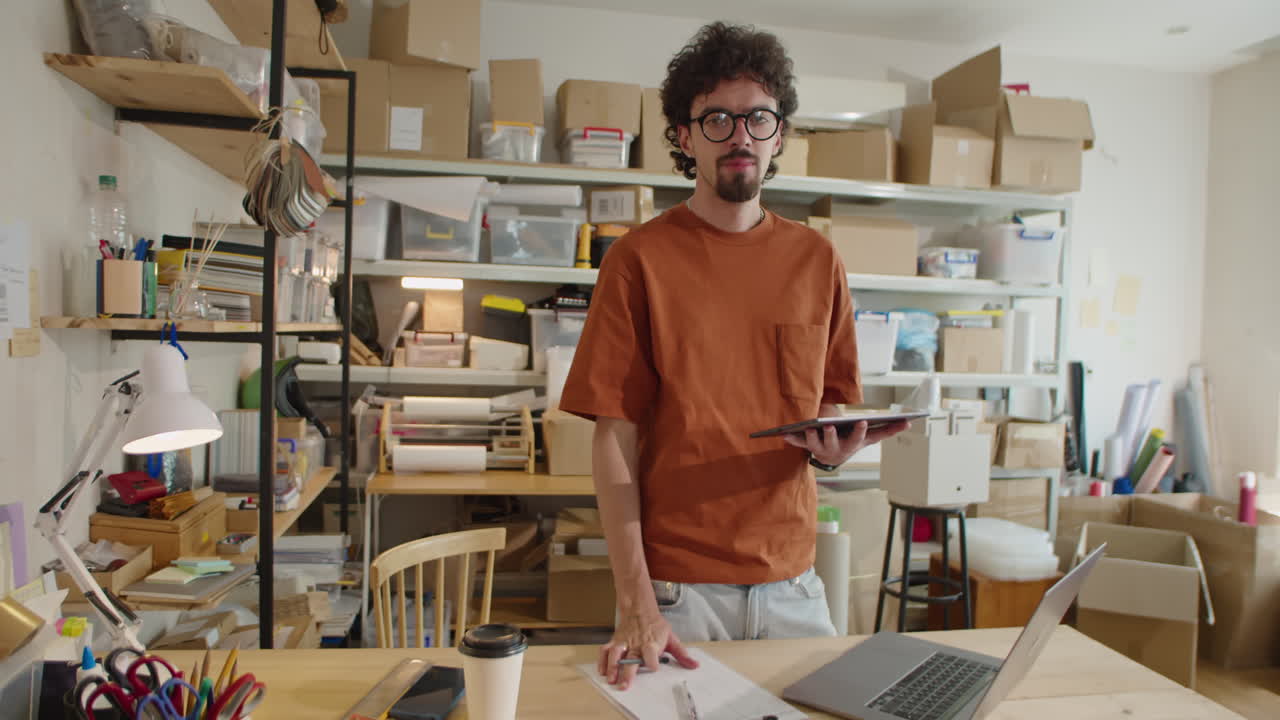 Portrait of Man with Tablet at Work in Delivery Service Warehouse