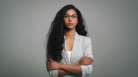 Portrait-of-serious-young-African-businesswoman-in-studio-shot