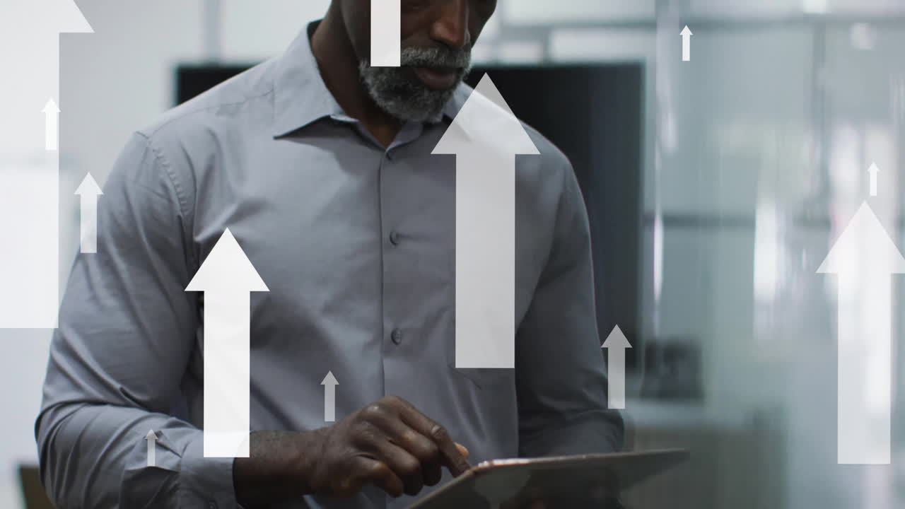 Animation of arrows and data processing over african american businessman in office