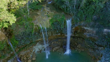 Waterfalls-and-Large-Natural-Pool-in-Bayaguana,-Monte-Plata,-Dominican-Republic---aerial-shot