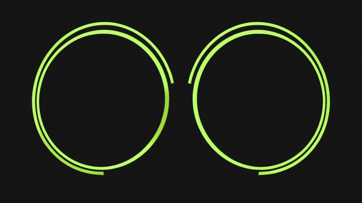 Animated Green Neon Circles Forming on Black Background