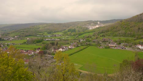 cheddar, england, showcasing the town's scenic landscape and famous cheese origins, aerial view
